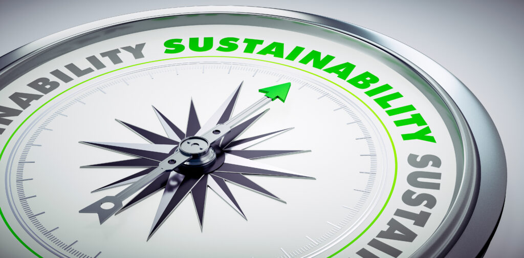 White,Compass,With,Needle,Pointing,To,The,Word,Sustainability,-